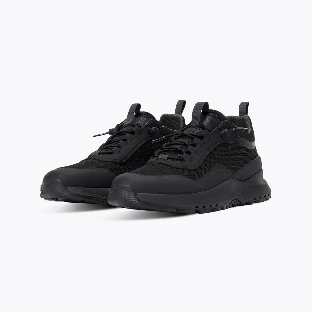 Solid on sale black sneakers